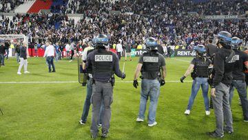 Football Soccer - Olympique Lyonnais v Besiktas - UEFA Europa League Quarter Final First Leg - Parc Olympique Lyonnais - 13/4/17 Police officers as Lyon fans invade the pitch and fans clash in the stands Reuters / Emmanuel Foudrot Livepic
