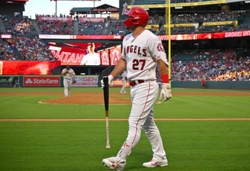 ANAHEIM, CA - JULY 12: Mike Trout #27 of the Los Angeles Angels walks back to the dugout after striking out in the third inning against the Houston Astros at Angel Stadium of Anaheim on July 12, 2022 in Anaheim, California.   Jayne Kamin-Oncea/Getty Images/AFP