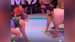 Luchadora de UFC intenta hacerle frente a un luchador de sumo