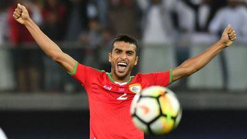 Oman&#039;s Mohammed al-Maslami celebrates after winning the 2017 Gulf Cup of Nations semi-final football match between Oman and Bahrain at the Sheikh Jaber al-Ahmad Stadium in Kuwait City on January 2, 2018.  / AFP PHOTO / GIUSEPPE CACACE
