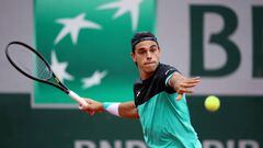 PARIS, FRANCE - MAY 23: Francisco Cerundolo of Argentina plays a forehand against Daniel Evans of Great Britain during the Men's Singles First Round match on Day 2 of The 2022 French Open at Roland Garros on May 23, 2022 in Paris, France. (Photo by Adam Pretty/Getty Images)