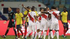 GOIANIA, BRAZIL - JUNE 20: Sergio Pe&ntilde;a and Christian Ramos of Peru celebrate with teammates after their second goal scored by an own goal of Yerry Mina of Colombia (not in frame) during a group B match between Colombia and Peru as part of Copa Amer