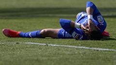 GETAFE, SPAIN - MARCH 21: Angel Rodriguez of Getafe CF lies injured on the pitch during the La Liga Santander match between Getafe CF and Elche CF at Coliseum Alfonso Perez on March 21, 2021 in Getafe, Spain. Sporting stadiums around the UK remain under s