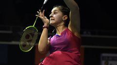 Carolina Marin of Spain returns a shot against Akane Yamaguchi of Japan during their women&#039;s singles quarter-final badminton match at the Singapore Open.