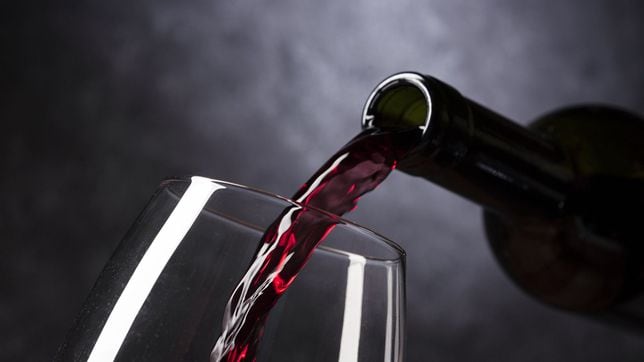 Why is France spending over $200 million to destroy surplus wine?