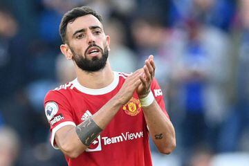 Manchester United's Portuguese midfielder Bruno Fernandes applauds the fans at the end of the English Premier League football match between Leicester City and Manchester United at King Power Stadium in Leicester, central England on October 16, 2021.