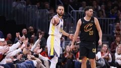 Nov 5, 2023; Cleveland, Ohio, USA; Golden State Warriors guard Steph Curry  (30) questions a call after losing a ball out of bounds while defended by Cleveland Cavaliers guard Georges Niang (20) in the second quarter at Rocket Mortgage FieldHouse. Mandatory Credit: Aaron Josefczyk-USA TODAY Sports