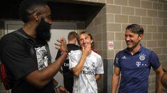 HOUSTON, TEXAS - JULY 20: James Harden talks to Luka Modric of Real and Niko Kovac, head coach of Bayern Muenchen after the International Champions Cup match between Bayern Muenchen and Real Madrid in the 2019 International Champions Cup at NRG Stadium on July 20, 2019 in Houston, Texas.  (Photo by Alexander Hassenstein/Bongarts/Getty Images)