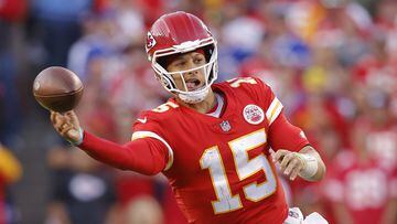KANSAS CITY, MISSOURI - OCTOBER 16: Patrick Mahomes #15 of the Kansas City Chiefs throws the ball during the fourth quarter against the Buffalo Bills at Arrowhead Stadium on October 16, 2022 in Kansas City, Missouri.   David Eulitt/Getty Images/AFP