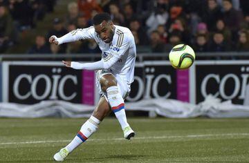 This file photo taken on April 03, 2016 shows Lyon's French forward Alexandre Lacazette kicks the ball to score during the French L1 football match between Lorient and Lyon at the Moustoir stadium in Lorient, western France.