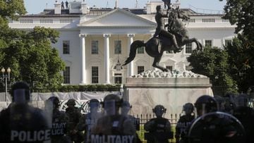 DC National Guard military police officers stand guard as demonstrators rally near the White House against the death in Minneapolis police custody of George Floyd, in Washington, D.C., U.S., June 1, 2020. REUTERS/Jonathan Ernst