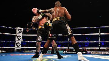 LONDON, ENGLAND - MARCH 24:  Dillian Whyte (black trunks) and Lucas Browne (black/green/yellow trunks) in action during their WBC Silver Heavyweight Championship  at The O2 Arena on March 24, 2018 in London, England.  (Photo by Dan Mullan/Getty Images)
