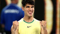 Spain's Carlos Alcaraz celebrates winning against France's Richard Gasquet during their men's singles match on day three of the Australian Open tennis tournament in Melbourne on January 16, 2024. (Photo by Martin KEEP / AFP) / -- IMAGE RESTRICTED TO EDITORIAL USE - STRICTLY NO COMMERCIAL USE --