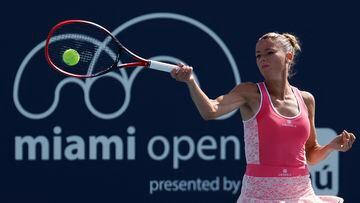 Mar 21, 2023; Miami, Florida, US; Camila Giorgi (ITA) hits a forehand against Kaia Kanepi (EST) (not pictured) during a on day two of the Miami Open at Hard Rock Stadium. Mandatory Credit: Geoff Burke-USA TODAY Sports