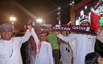 Qatari fans cheer after their national team defeated UAE to qualify to the final of the 2019 AFC Asian Cup on January 29, 2019, in the Qatari capital Doha.