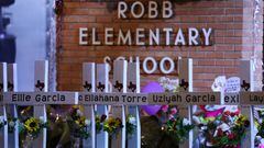 Flowers are placed on a make shift memorial outside Robb Elementary School in Uvalde, Texas, on May 25, 2022.