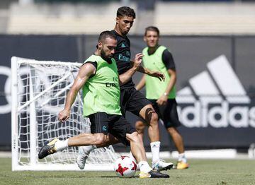 Achraf (centre) challenges first-choice right-back Carvajal in pre-season training in the US.