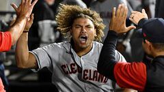 Cleveland Guardians right fielder Josh Naylor celebrates in the dugout after hitting a three run home run against the Chicago White Sox during the eleventh inning at Guaranteed Rate Field.