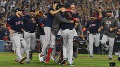 Oct 28, 2018; Los Angeles, CA, USA; Boston Red Sox pitcher Chris Sale (41) celebrates with teammates including catcher Christian Vazquez after defeating the Los Angeles Dodgers in game five of the 2018 World Series at Dodger Stadium. 