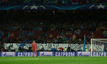 A banner reading in Catalan "Freedom for Jordis" in reference to Catalan separatist leaders, Jordi Cuixart and Jordi Sanchez arrested by police, is seen during the UEFA Champions League group D football match FC Barcelona vs Olympiacos FC at the Camp Nou 