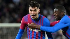 Barcelona&#039;s Spanish midfielder Pedri celebrates scoring the opening goal with Barcelona&#039;s French forward Ousmane Dembele (R) during the Spanish League football match between FC Barcelona and Sevilla FC at the Camp Nou stadium in Barcelona on Apr