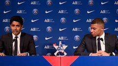 Paris Saint-Germain&#039;s CEO Nasser Al-Khelaifi (L) and French forward Kylian Mbappe (R) give a press conference at the Parc des Princes stadium in Paris on May 23, 2022, two days after the club won the Ligue 1 title for a record-equalling tenth time an