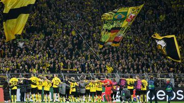 Dortmund's players celebrate with fans after the UEFA Champions League Group G football match between Borussia Dortmund and Manchester City in Dortmund, western Germany on October 25, 2022. - The match ended in a 0-0 draw. (Photo by Sascha Schuermann / AFP)