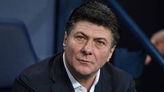 (FILES) This file photo taken on December 14, 2016 shows Watford&#039;s Italian head coach Walter Mazzarri waiting for kick off during the English Premier League football match between Manchester City and Watford at the Etihad Stadium in Manchester, north