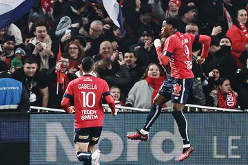 David celebrates scoring the second of three goals for Lille against Lyon. 
