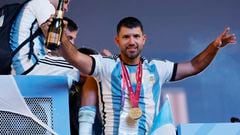 Soccer Football - FIFA World Cup Qatar 2022 - Final - Argentina v France - Lusail, Qatar - December 19, 2022 Argentina's Sergio Aguero celebrates with teammates on a bus after winning the World Cup REUTERS/Thaier Al-Sudani