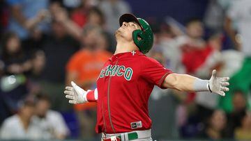 MIAMI, FLORIDA - MARCH 20: Luis Urias #3 of Team Mexico reacts after hitting a three-run home run in the fourth inning against Team Japan during the World Baseball Classic Semifinals at loanDepot park on March 20, 2023 in Miami, Florida.   Megan Briggs/Getty Images/AFP (Photo by Megan Briggs / GETTY IMAGES NORTH AMERICA / Getty Images via AFP)