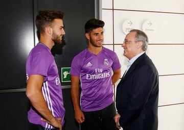 Mayoral (left) chats with Real president Florentino Pérez (right) this pre-season.