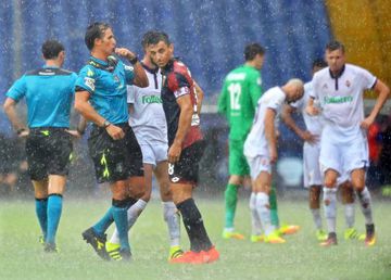 Torrential rain forced officials to abandon Genoa's clash with Fiorentina this afternoon