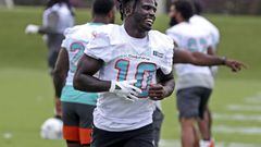 Miami Dolphins wide receiver Tyreek Hill (10) warms up during OTA practice on Tuesday, May 17, 2022, at the team&apos;s training facility in Miami Gardens, Florida. (Susan Stocker/South Florida Sun Sentinel/Tribune News Service via Getty Images)