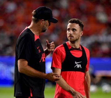 Klopp talking with Diogo Jota of Liverpool during an open training session at Rajamangala National Stadium on July 11, 2022 in Bangkok, Thailand.