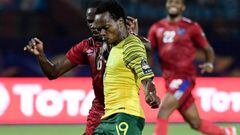 South Africa&#039;s forward Percy Tau (R) is marked by Namibia&#039;s midfielder Larry Horaeb during the 2019 Africa Cup of Nations (CAN) Group D football match between South Africa and Namibia at the Al Salam Stadium in the Egyptian capital Ciaro on June