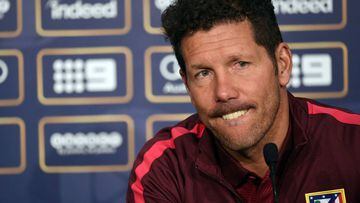 Atletico Madrid manager Diego Simeone attends a press conference prior to a football training session at AAMI Park in Melbourne on July 28, 2016. / AFP PHOTO / SAEED KHAN / --IMAGE RESTRICTED TO EDITORIAL USE - STRICTLY NO COMMERCIAL USE--