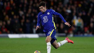 Chelsea&#039;s US midfielder Christian Pulisic runs with the ball during the English Premier League football match between Watford and Chelsea at Vicarage Road Stadium in Watford, north-west of London, on December 1, 2021. (Photo by Adrian DENNIS / AFP) / RESTRICTED TO EDITORIAL USE. No use with unauthorized audio, video, data, fixture lists, club/league logos or &#039;live&#039; services. Online in-match use limited to 120 images. An additional 40 images may be used in extra time. No video emulation. Social media in-match use limited to 120 images. An additional 40 images may be used in extra time. No use in betting publications, games or single club/league/player publications. / 