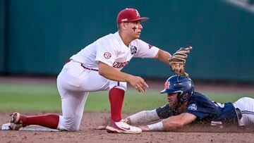 The Ole Miss Rebels posted a statement of intent in the top bracket of the College World Series, beating the Arkansas Razorbacks soundly