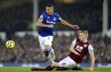 Burnley defender Ben Mee (6) gets the tackle on Everton forward Richarlison (7) during the English championship Premier League football match between Everton and Burnley on December 26, 2019 at Goodison Park
