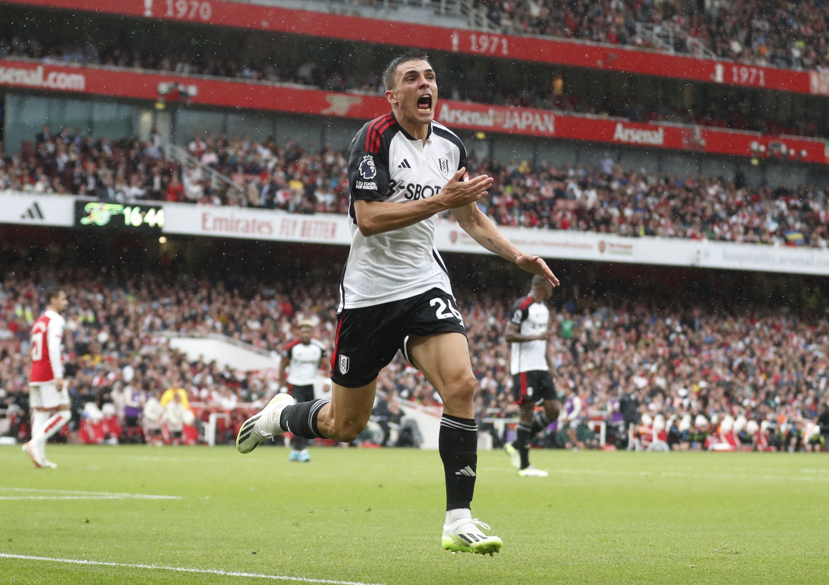 Soccer Football - Premier League - Arsenal v Fulham - Emirates Stadium, London, Britain - August 26, 2023 Fulham's Joao Palhinha celebrates scoring their second goal Action Images via Reuters/Matthew Childs EDITORIAL USE ONLY. No use with unauthorized audio, video, data, fixture lists, club/league logos or 'live' services. Online in-match use limited to 75 images, no video emulation. No use in betting, games or single club /league/player publications.  Please contact your account representative for further details.