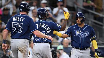Jun 16, 2023; San Diego, California, USA; Tampa Bay Rays left fielder Randy Arozarena (56) is congratulated by third baseman Isaac Paredes (17) after hitting a three-run home run against the San Diego Padres during the fifth inning at Petco Park. Mandatory Credit: Orlando Ramirez-USA TODAY Sports