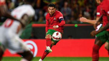 (FILES) In this file photo taken on June 05, 2022 Portugal's forward Cristiano Ronaldo kicks the ball during the UEFA Nations League, league A group2 football match between Portugal and Switzerland in Lisbon. - US district judge, Judge Jennifer Dorsey, in Las Vegas on June 10, 2022, dismissed a rape lawsuit against Ronaldo, castigating the legal team behind the complaint. Dorsey threw out the case brought by Kathryn Mayorga of Nevada, who alleged she was assaulted by the Portuguese soccer star in a Las Vegas hotel room in 2009. (Photo by PATRICIA DE MELO MOREIRA / AFP)