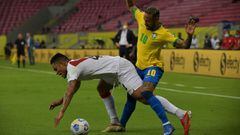 Peru&#039;s Anderson Santamaria (L) and Brazil&#039;s Neymar vie for the ball during their South American qualification football match for the FIFA World Cup Qatar 2022 at the Pernambuco Arena in Recife, Brazil, on September 9, 2021. (Photo by NELSON ALME