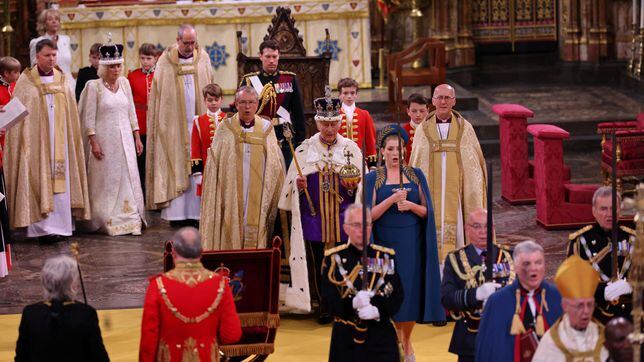 Who is Penny Mordaunt? The woman in the teal-colored dress carrying the 17th-century Sword of State