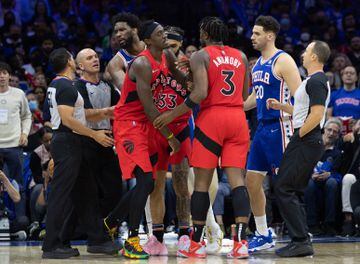 Philadelphia 76ers center Joel Embiid (21) has words with officials and Toronto Raptors forward Pascal Siakam (43) during the fourth quarter.