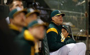 OAKLAND, CA - SEPTEMBER 23: Bruce Maxwell #13 of the Oakland Athletics sits in the dugout during the game against the Texas Rangers