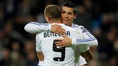 MADRID, SPAIN - DECEMBER 08: Karim Benzema (#9) of Real Madrid celebrates with Cristiano Ronaldo after scoring Real's opening goal during the Champions League group G match between Real Madrid and AJ Auxerre at Estadio Santiago Bernabeu on December 8, 2010 in Madrid, Spain. (Photo by Angel Martinez/Getty Images)