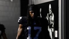 Davante Adams of the Las Vegas Raiders looks on as he waits in the tunnel to take the field prior to a preseason game against the Minnesota Vikings at Allegiant Stadium on August 14, 2022 in Las Vegas, Nevada.