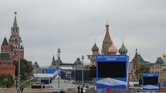 A view shows screens and banners on constructions erected ahead of an expected event, dedicated to the results of referendums on the joining of four Ukrainian self-proclaimed regions to Russia, on a bridge near the Kremlin and Red Square in central Moscow, Russia September 29, 2022. Slogans on the banners read: "Donetsk, Luhansk, Zaporizhzhia, Kherson - Russia!"  REUTERS/Evgenia Novozhenina